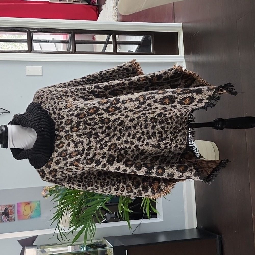 Fold Down Ribbed Neck Cheetah Print Knit Poncho Sweater with Fringe